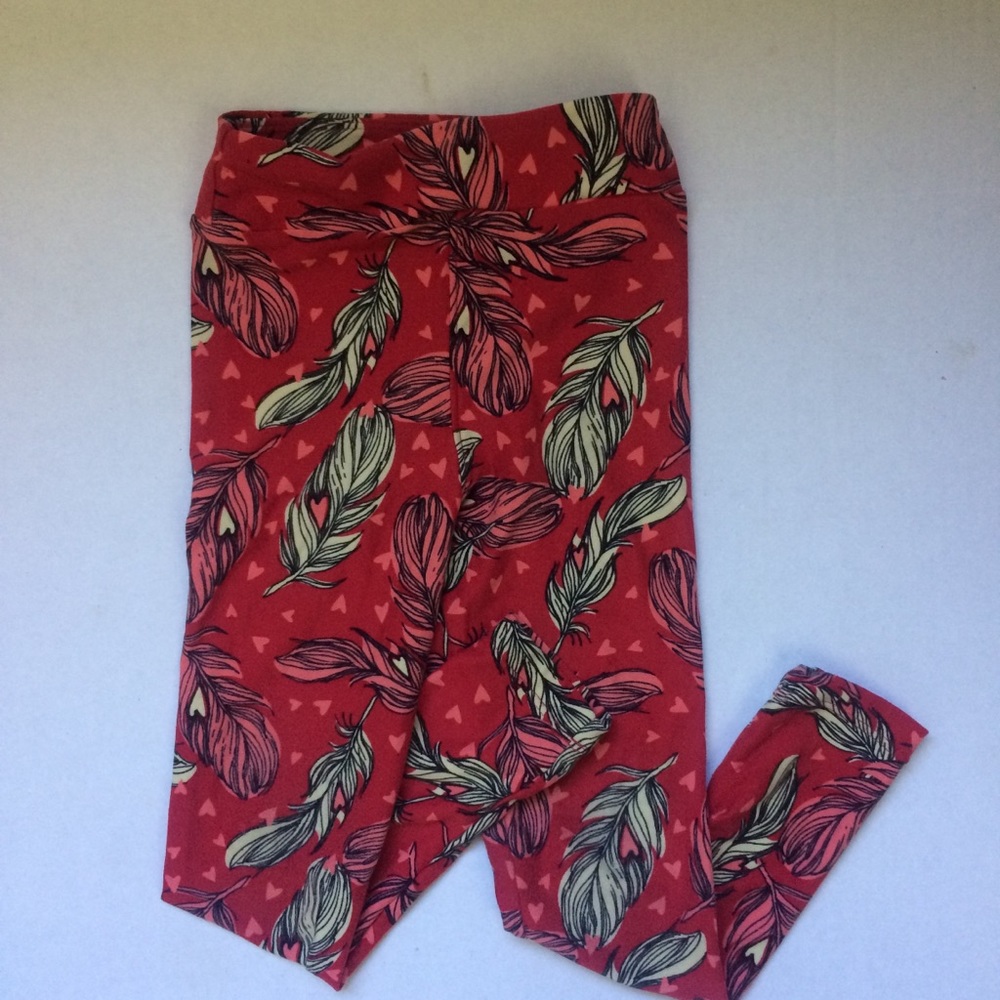 Red LuLaRoe leggings with hearts and feathers